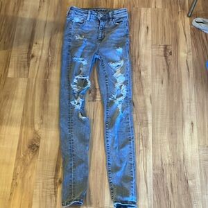 American Eagle Womens distressed grey jeans